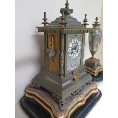 150 - A good 19th century French silvered and gilt metal chinoiserie decorated clock garniture set with a ... 