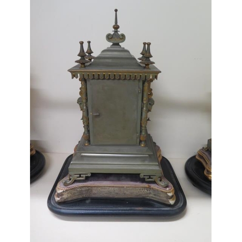 150 - A good 19th century French silvered and gilt metal chinoiserie decorated clock garniture set with a ... 