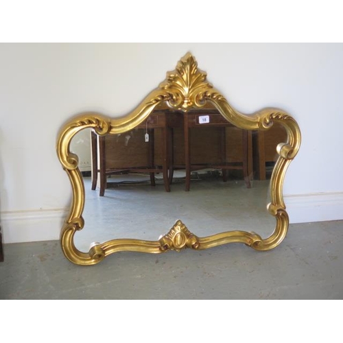 18 - A modern ornate gilt mirror, 70cm tall x 80cm wide, in good condition