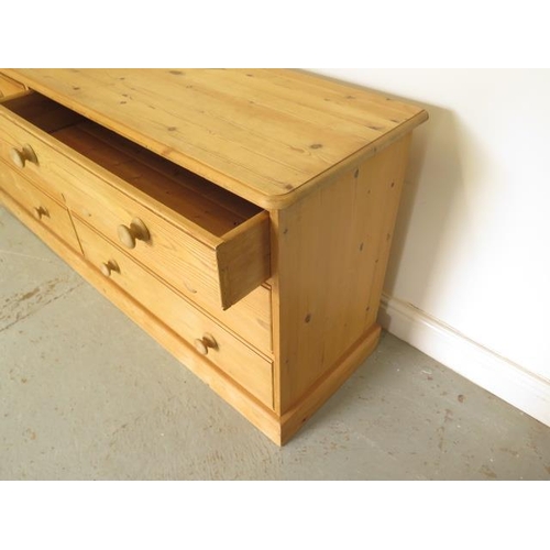 20 - A pine 6 drawer long chest, 69cm tall x 173cm x 44cm, in good condition