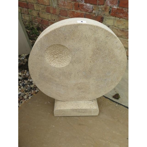 4 - A circular abstract garden sculpture, carved in Clipsham limestone by a Cambridgeshire based stone c... 