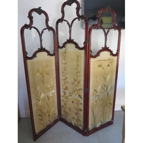 54 - A 19th century mahogany ornate salon three fold vanity screen with silk linings and glazed top, 190c... 