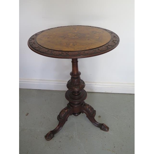 A Victorian carved walnut side table inlaid with George and the Dragon, 71cm tall x 49cm diameter