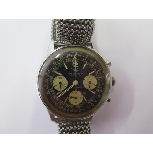 665 - A vintage Breitling Navitmer stainless steel chronograph wristwatch ref 806 with black dial and 3 wh... 