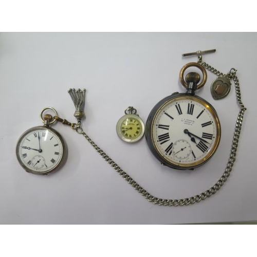 667 - A silver top wind pocket watch on chain, 45mm case, running, a Goliath type watch, 75mm case, needs ... 