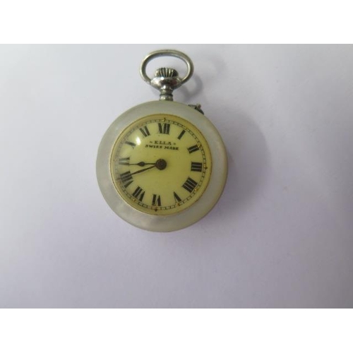 667 - A silver top wind pocket watch on chain, 45mm case, running, a Goliath type watch, 75mm case, needs ... 