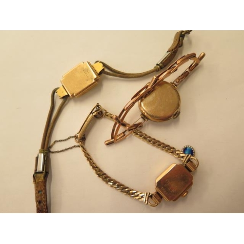 674 - An 18ct yellow gold ladies wristwatch on a 9ct strap, approx 19.5 grams, an 18ct watch on a leather ... 