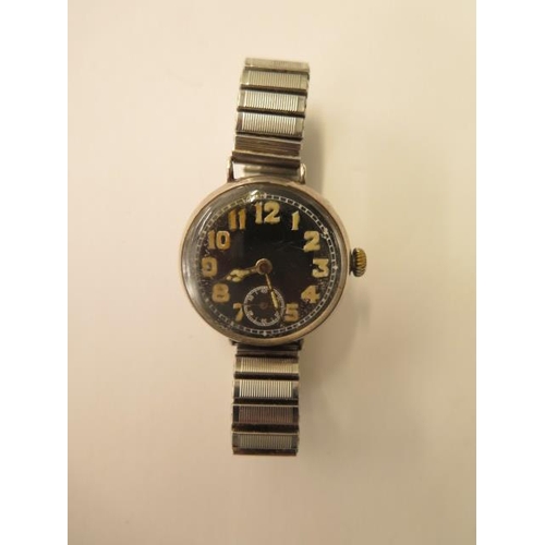 675 - A silver Cunard black dial trench type watch, 32mm case on a later sprung strap, working, hands adju... 