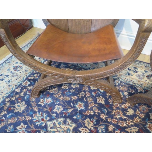 74 - A pair of early 20th century oak Abbots style chairs with leather seats, 93cm tall x 60cm wide, seat... 