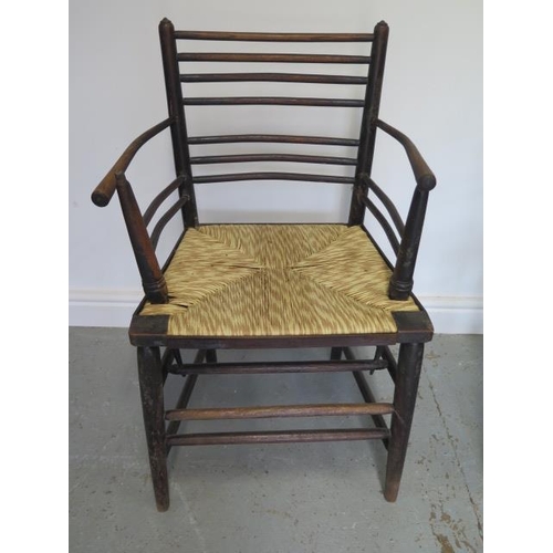 82 - A set of six 19th century ebonised William Morris type rush seated Sussex armchairs, all have been r... 