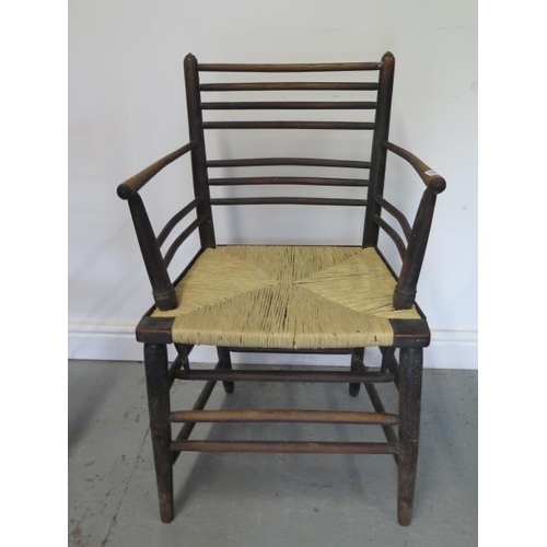 82 - A set of six 19th century ebonised William Morris type rush seated Sussex armchairs, all have been r... 