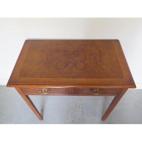83 - A new walnut two drawer side table on square chamfered legs, made by a local craftsman to a high sta... 