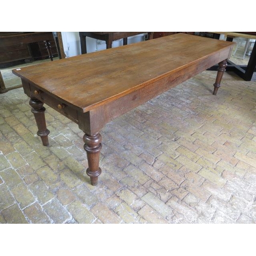 91 - A 19th Oak and Ash ? dining table with an end drawer on turned legs, 76cm tall x 260cm x 85cm