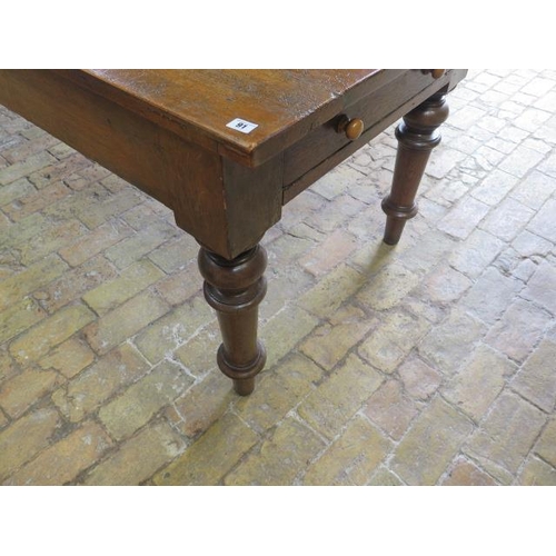 91 - A 19th Oak and Ash ? dining table with an end drawer on turned legs, 76cm tall x 260cm x 85cm