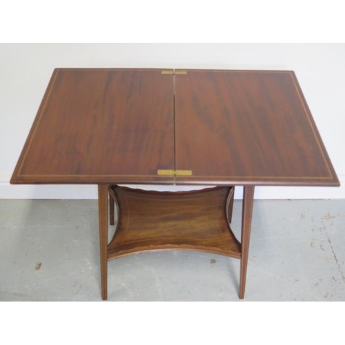 94 - An Edwardian Edwards and Roberts mahogany foldover top side table with an undertier, 66cm tall 51cm ... 