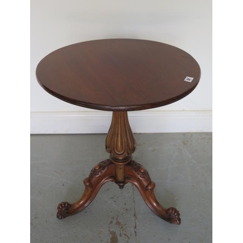 97 - A mahogany circular side table on a carved tripod base, 57cm tall x 53cm diameter, in good polished ... 