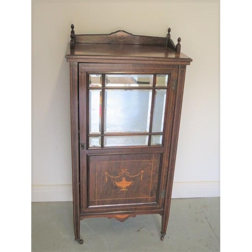 98 - A late Victorian / Edwardian inlaid rosewood mirror fronted cabinet with a shelved interior, 117cm t... 