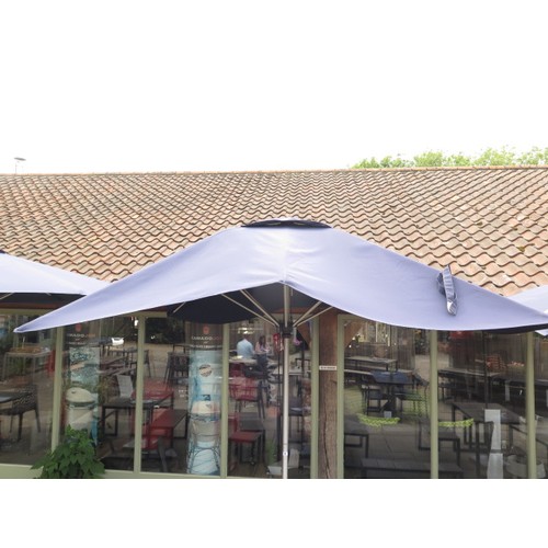 27 - A 2.4m blue pulley cord wind parasol, no base