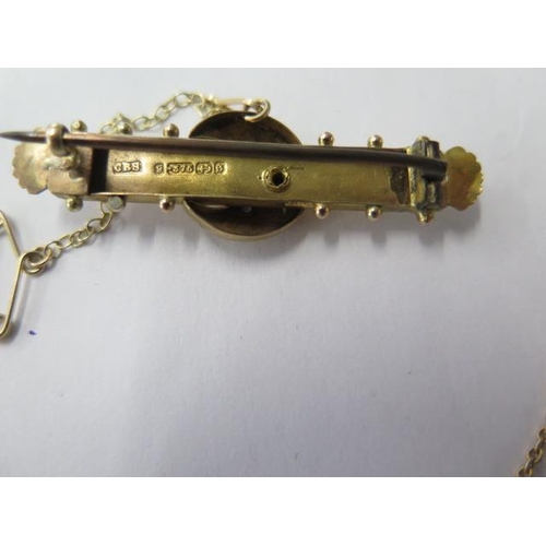 479 - A 15ct pendant 2cm x 3cm, on a 9ct chain 46cm long and a 9ct bar brooch, total weight approx 13 gram... 