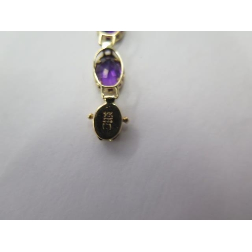 491 - A 14ct 585 yellow gold amethyst bracelet, 19cm long, approx 6.6 grams, in good condition
