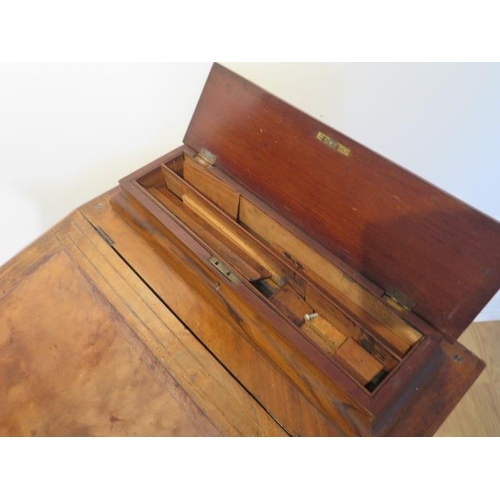 51 - A Victorian inlaid walnut 4 drawer Davenport desk in need of  restoration missing back foot, 81cm ta... 