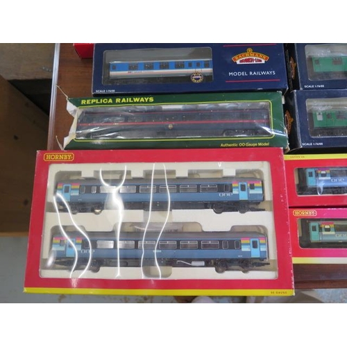 774 - A good collection of 00 gauge boxed rolling stock, coaches, including Bachmann, Hornby, Top Link, 29... 