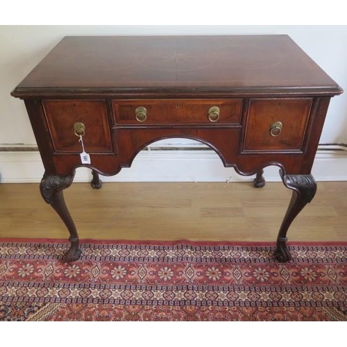 101 - A re-veneered 3 drawer walnut and mahogany lowboy on acanthus carved cabriole legs, 75cm tall x 91cm... 