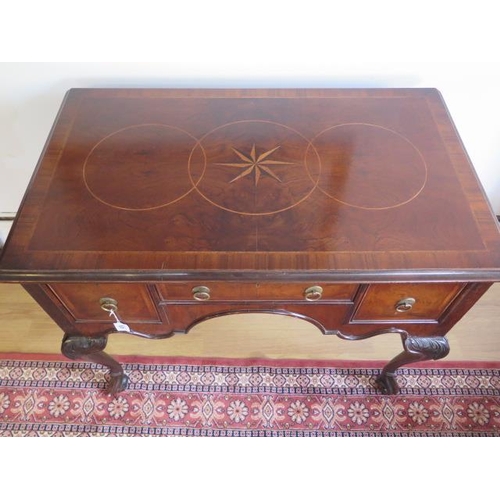 101 - A re-veneered 3 drawer walnut and mahogany lowboy on acanthus carved cabriole legs, 75cm tall x 91cm... 