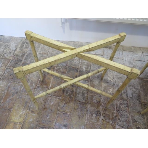18 - A pair of pretty faux bamboo tray tables with folding bases, 57cm tall x 75cm x 53cm