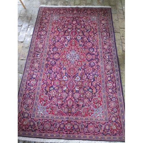 208 - A hand knotted woollen Karajeh rug, 2.15m x 1.35m