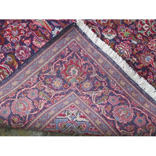 208 - A hand knotted woollen Karajeh rug, 2.15m x 1.35m