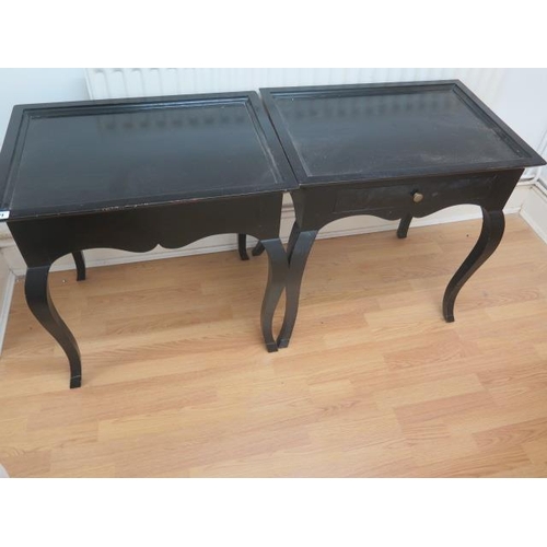 21 - A pair of ebonised side tables possibly by Nicky Haslam, 72cm tall x 70cm x 49cm
