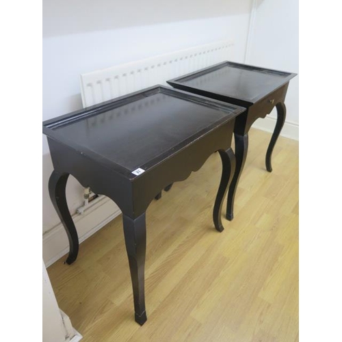 21 - A pair of ebonised side tables possibly by Nicky Haslam, 72cm tall x 70cm x 49cm