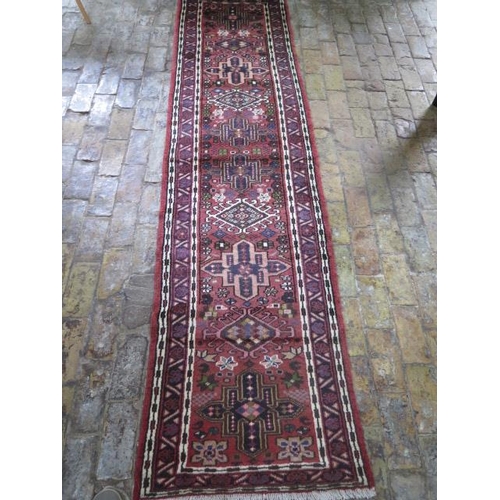 212 - A hand knotted woollen Karajeh rug, 2.82m x 1.72m