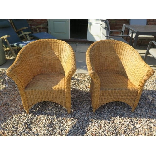 28 - A pair of modern wicker armchairs