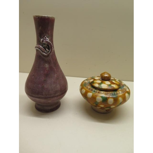 291 - A Chinese stoneware lidded pot and a dusky pink glaze stoneware vase, 17cm tall, both good condition
