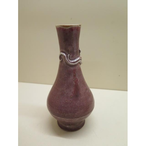 291 - A Chinese stoneware lidded pot and a dusky pink glaze stoneware vase, 17cm tall, both good condition