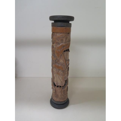 302 - A carved Oriental bamboo pot pouri cylinder, 28cm tall