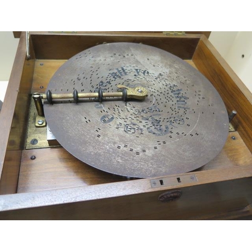 309 - A 19th century Polyphon with 22 discs, in working order