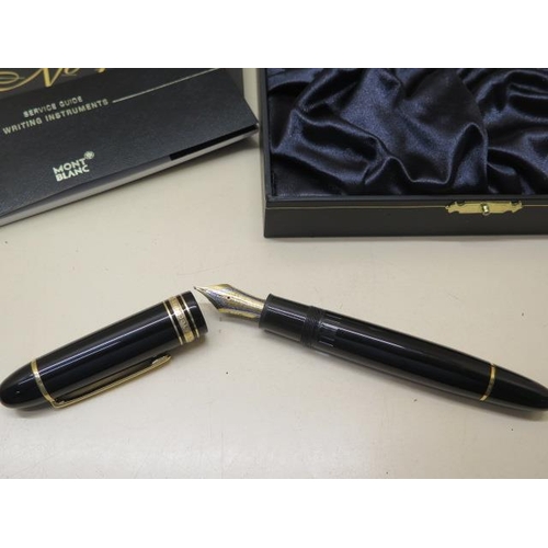 311 - A boxed Mont Blanc Meisterstuck No 149 fountain ink pen with 18K gold nib, with booklets and purchas... 