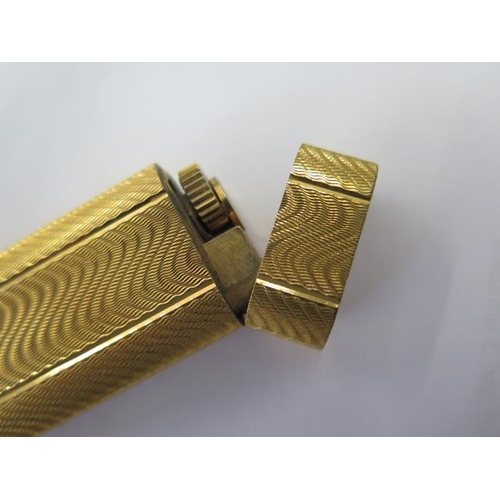 315 - A Cartier gold plated gas lighter, 7cm tall, no 68891, no box, some small wear, not tested