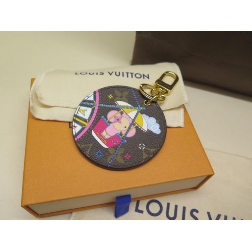 335 - A Louis Vuitton Christmas mini pouch Damier Ebene evening bag and matching key ring, both boxed, box... 