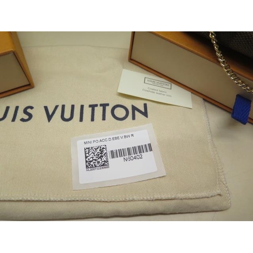 335 - A Louis Vuitton Christmas mini pouch Damier Ebene evening bag and matching key ring, both boxed, box... 