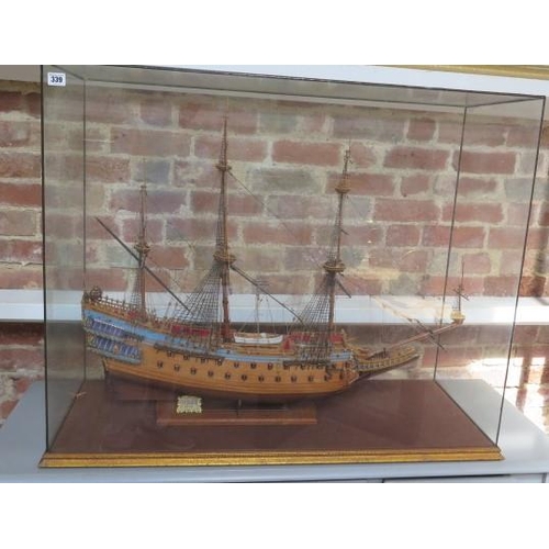 339 - A wooden hand built model of the three mast sailing ship Wasa 1628 under a perspex show case, show c... 