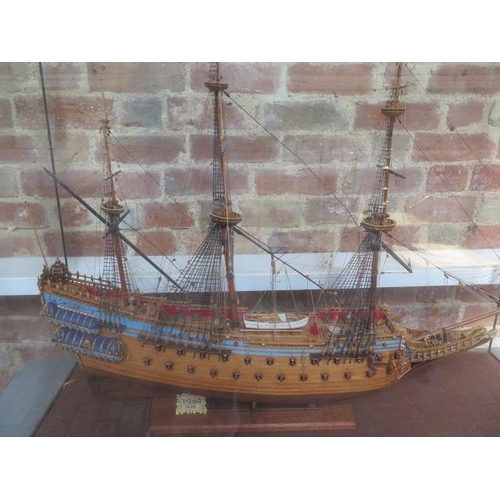 339 - A wooden hand built model of the three mast sailing ship Wasa 1628 under a perspex show case, show c... 