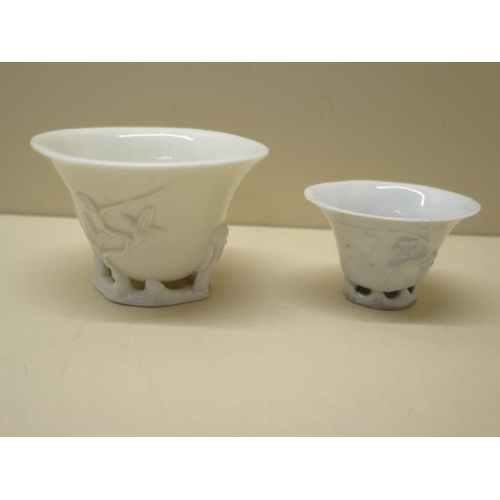 340 - A Chinese Fukien Provence 18th century wine cup together with a smaller wine cup, 6cm x 9cm tallest,... 