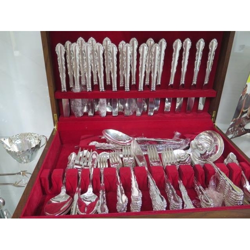 410 - A part silver plated canteen of cutlery and other plated ware including a candelabra