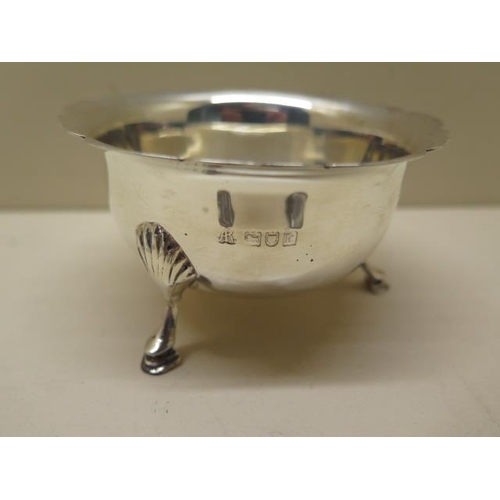 411 - A silver bowl and silver presentation dish and assorted spoons, total weight approx 8.7 troy oz