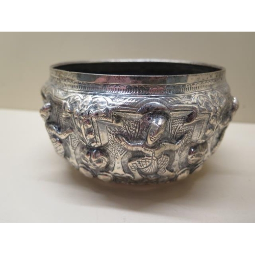 412 - Two embossed Eastern white metal bowls 9cm and 7cm tall, total approx 14.3 troy oz, some denting but... 