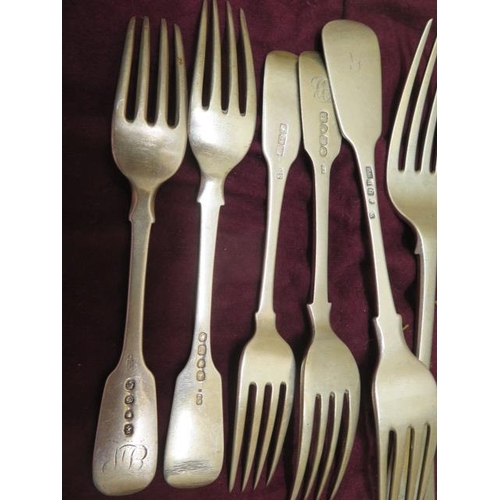 414 - A collection of assorted silver flatware, assorted dates and makers, and assorted steel knives, tota... 